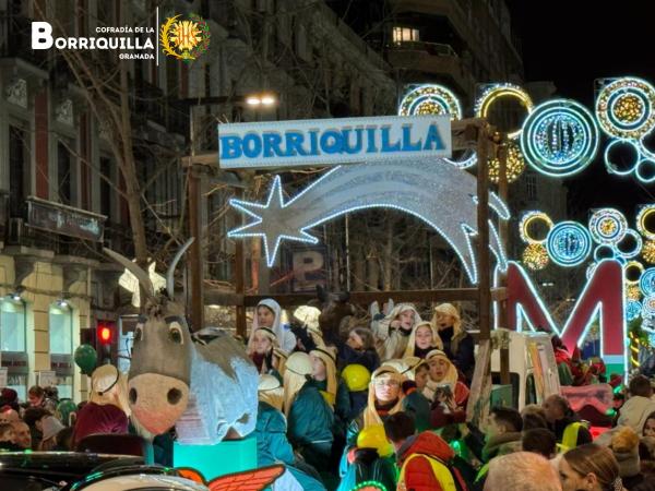 Cofradía Borriquilla Granada: SONRISAS, ILUSIÓN, ESPERANZA Y MUCHA ALEGRIA REPARTIMOS EN LA CARROZA DE LA BORRIQUILLA